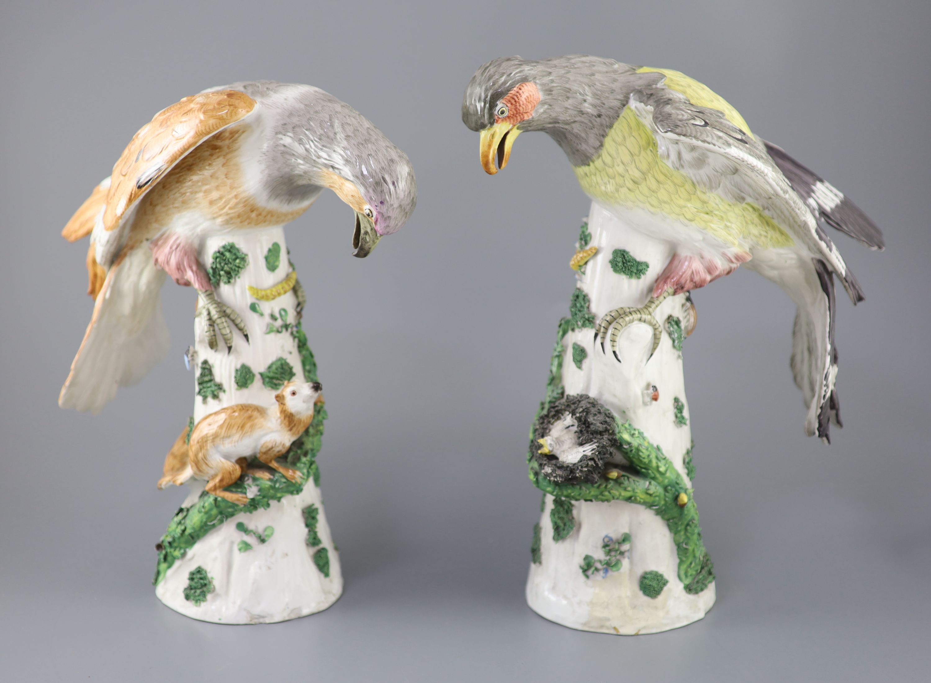 A pair of large German porcelain models of raptors, late 19th century, 37cm and 39cm